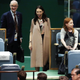 Ardern reacts as she sees her baby Neve at the Nelson Mandela Peace Summit on Sept. 24.